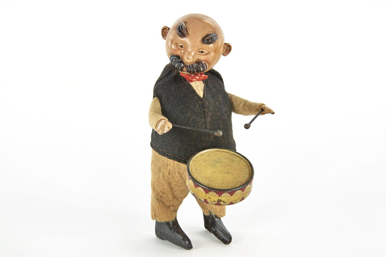 Schuco Tanzfigur Vater mit Trommel